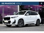 BMW X1 sDrive20i High Executive M Sport Automaat / Trekhaak, Auto's, BMW, 1525 kg, 156 pk, Met garantie (alle), Wit