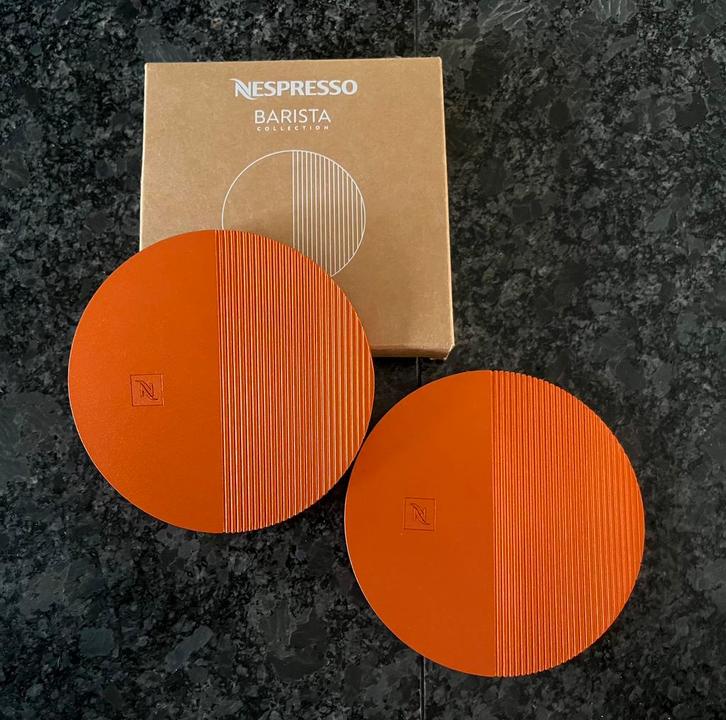 Nieuw! 2 oranje Nespresso Barista Coasters onderzetters., Huis en Inrichting, Woonaccessoires | Onderzetters, Nieuw, Glas of Kopje