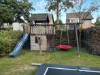 Groot speelhuis met glijbaan, schommels en eet/speelruimtes, Kinderen en Baby's, Speelgoed | Buiten | Speeltoestellen, Ophalen