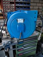 Perslucht slanghaspel, Ophalen