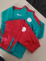 PSG trainingspak maat 134, Sport en Fitness, Voetbal, Maat XS of kleiner, Ophalen of Verzenden, Zo goed als nieuw, Trainingspak