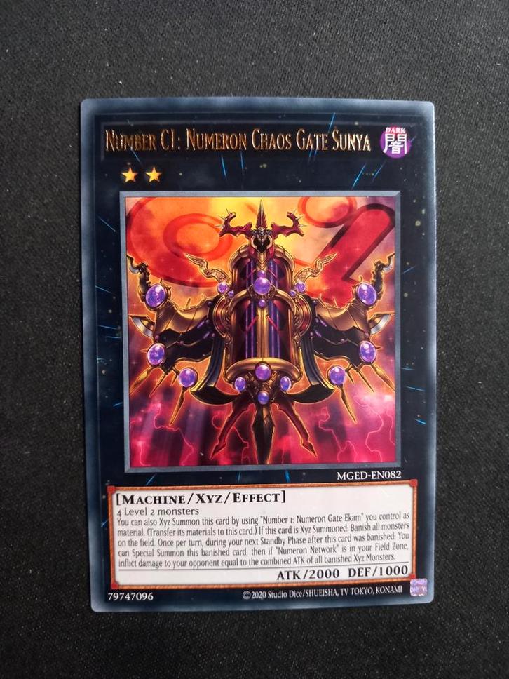 Maximum Gold: Number CI: Numeron Chaos Gate Sunya NM, Hobby en Vrije tijd, Verzamelkaartspellen | Yu-gi-Oh!, Zo goed als nieuw