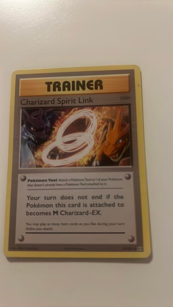 Trainer Charizard Spirit Link, Hobby en Vrije tijd, Verzamelkaartspellen | Pokémon, Ophalen of Verzenden, Zo goed als nieuw