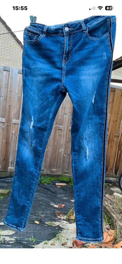 Blauwe ripped jeans van Monday Premium met bies maat 40., Ophalen of Verzenden, Zo goed als nieuw, Blauw, W30 - W32 (confectie 38/40)