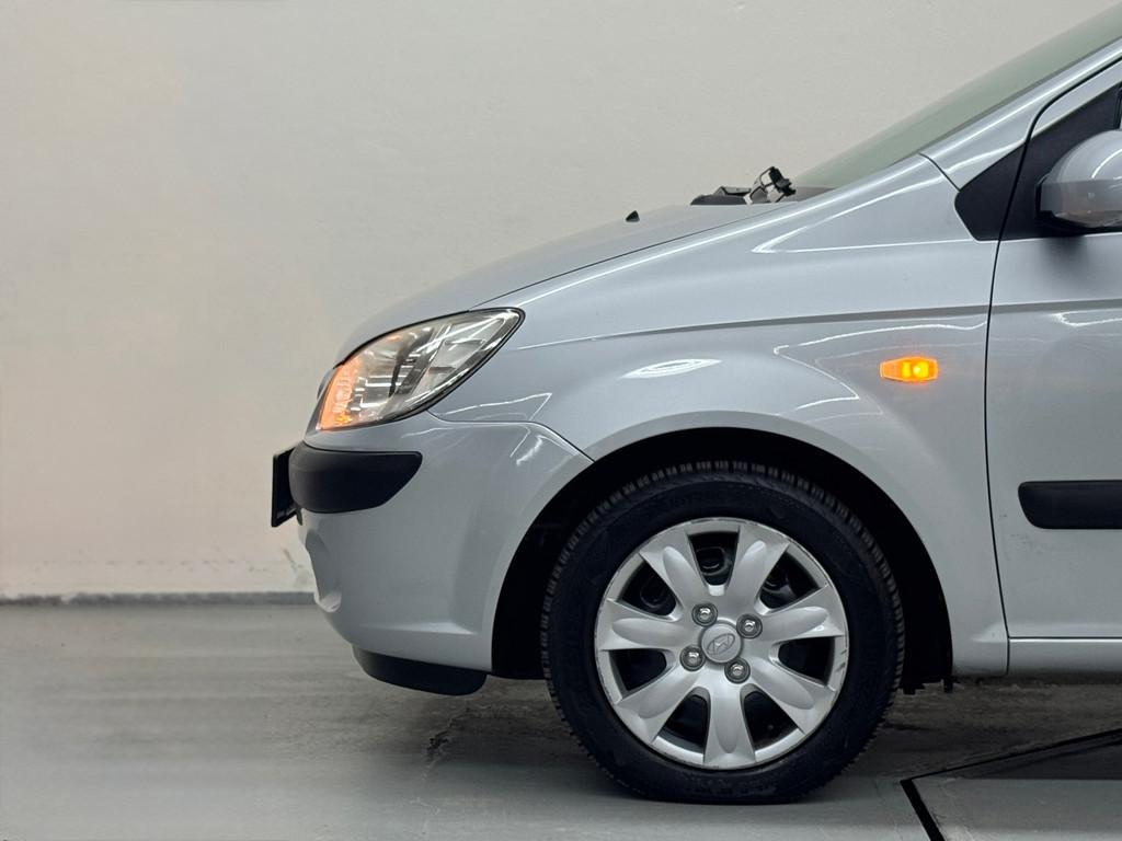 Hyundai Getz 1.4i Active Sense Automaat Airco D.RIEM Vv, Zwart, 4 cilinders, Metallic lak, Origineel Nederlands