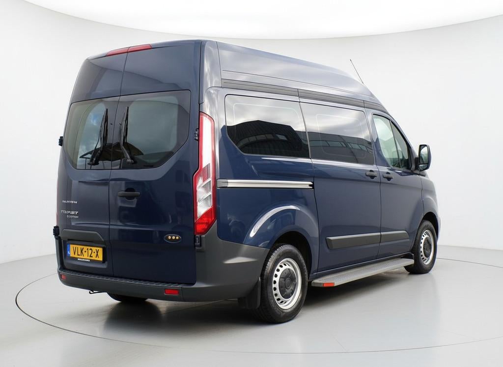 Ford Transit Custom 310 2.2 TDCI L1H2 Ambiente DC Rolstoelbu, Auto's, Bestelauto's, Voorwielaandrijving, Euro 5, 4 cilinders, 14 km/l