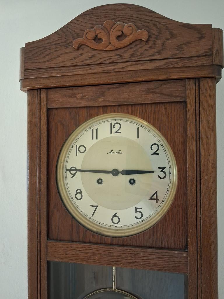 Antieke Mauthe wandklok, Ophalen