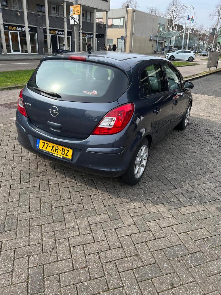 Opel Corsa 1.2 16V 5D WR 2007 Grijs, Voorwielaandrijving, 4 cilinders, 1229 cc, 49 €/maand