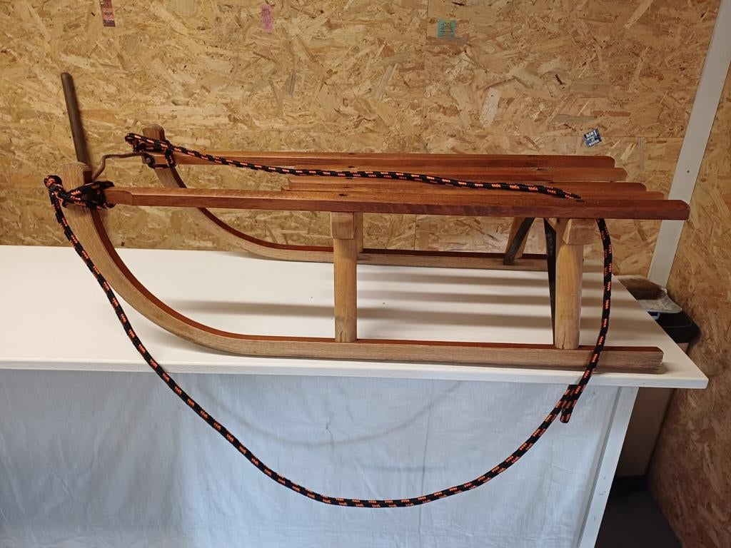 Houten slee merk davos, Ophalen, Gebruikt