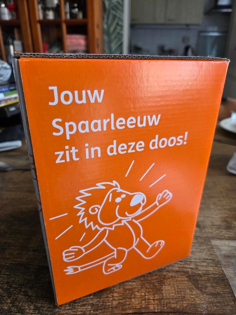 Nieuwe spaarleeuw met doos, Ophalen of Verzenden