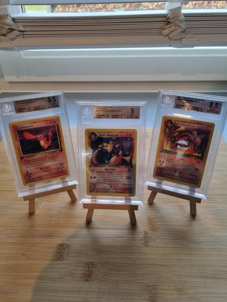 1st edition Dark Charizard, Charmeleon en Charmender (BGS), Ophalen of Verzenden, Zo goed als nieuw, Meerdere kaarten, Foil