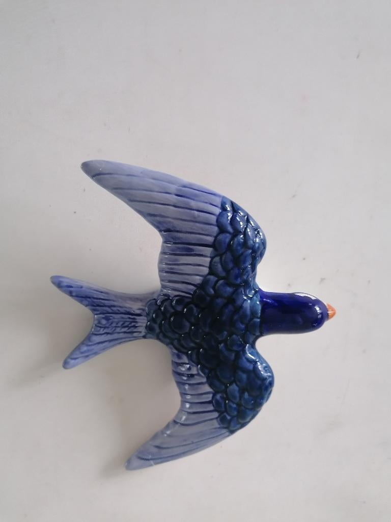 zwaluw voor aan de wand, Ophalen of Verzenden, Zo goed als nieuw, Mens