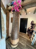 Handgesneden palmvaas, Ophalen