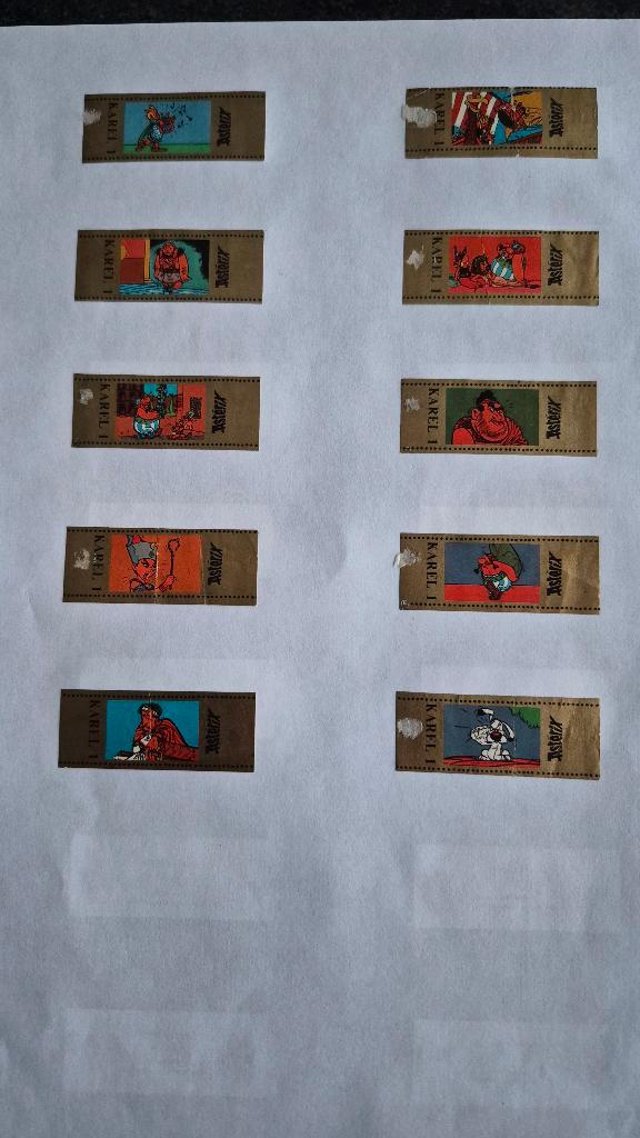 sigarenbandjes asterix / flintstones, Verzamelen, Rookartikelen, Aanstekers en Luciferdoosjes, Gebruikt, Sigarenbandjes, Verzenden