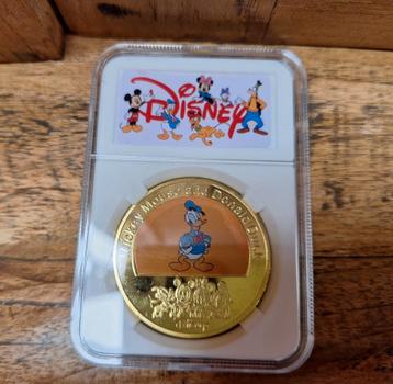 Grote vergulde Disney collector munt  beschikbaar voor biedingen