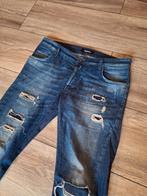 Tigha jeans, stretch, tapered fit, 32-34 met gaten. i.z.g.s., Blauw, Tigha, W32 (confectie 46) of kleiner, Ophalen of Verzenden