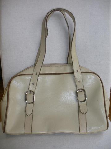 Tas beige beschikbaar voor biedingen