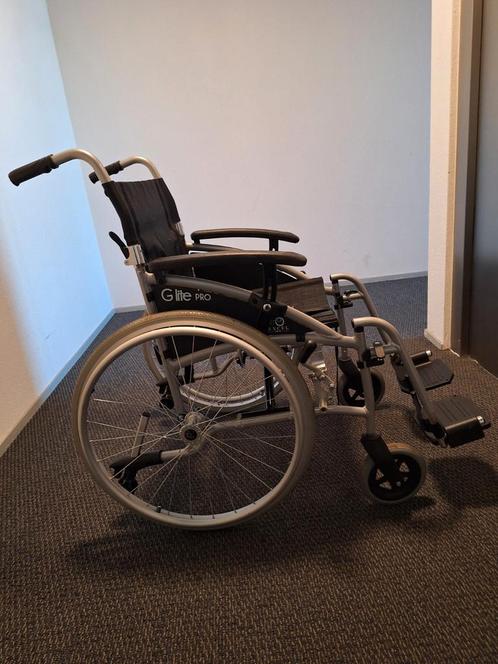 Rolstoel Lichtgewicht aluminium lees beschrijving goedestaat, Diversen, Rolstoelen, Zo goed als nieuw, Duwrolstoel, Inklapbaar