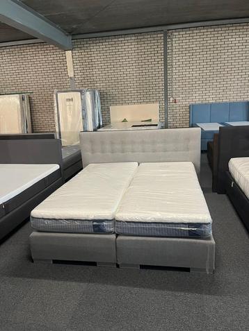 Boxspring met 2x auping evolve matrassen soft en firm  beschikbaar voor biedingen
