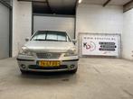 Suzuki Liana 1.6 2003 Grijs, Auto's, Suzuki, 47 €/maand, Origineel Nederlands, Te koop, Zilver of Grijs