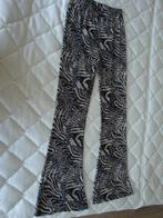 Maat 40. Lange flared broek met animal print., Maat 38/40 (M), Overige kleuren, Ophalen of Verzenden, Zo goed als nieuw