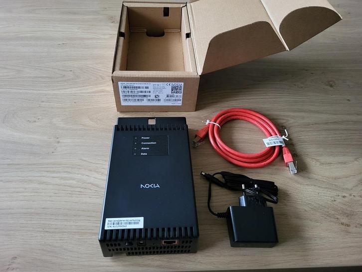 Nokia XGS-PON ONT glasvezelmodem Nieuw in doos!, Computers en Software, Routers en Modems, Nieuw, Router met modem, Ophalen of Verzenden