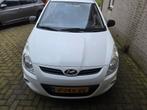 Hyundai i20 - benzine - 1.2 - 2010 - Wit, Auto's, Voorwielaandrijving, 450 kg, 31 €/maand, 4 cilinders