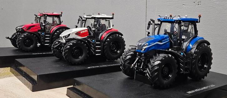New Holland T7.210/Steyr 6200 CVT/Case 185 CVX agritechnica, Hobby en Vrije tijd, Modelauto's | 1:32, Nieuw, Tractor of Landbouw