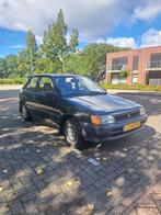 Toyota Starlet 1.3 XLi 12V E2 1995 Zwart - Met werk, Auto's, Stof, 4 cilinders, Zwart, Origineel Nederlands