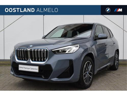 BMW iX1 xDrive30 High Executive M Sport / Trekhaak / Sportst, Auto's, BMW, Bedrijf, Te koop, iX1, 4x4, Achteruitrijcamera, Isofix