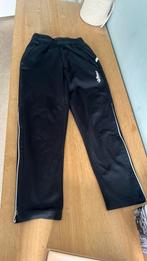Zwarte trainingsbroek Reece 128, Sport en Fitness, Hockey, Ophalen of Verzenden, Zo goed als nieuw, Kleding