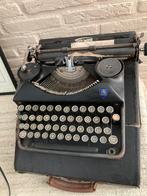 Antieke Triumph typmachine, Ophalen