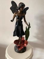 Bronzen elf staand op een roos brons  54 cm, Ophalen of Verzenden