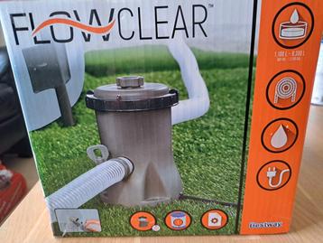 Filterpomp zwembad  met 2 nieuwe filters in verpakking beschikbaar voor biedingen