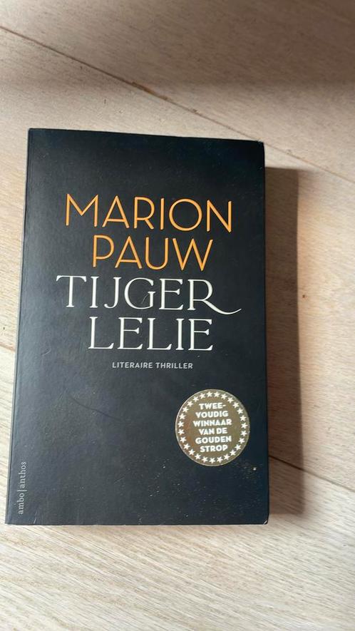 Marion Pauw - Tijgerlelie, Boeken, Thrillers, Zo goed als nieuw, Nederland, Ophalen of Verzenden