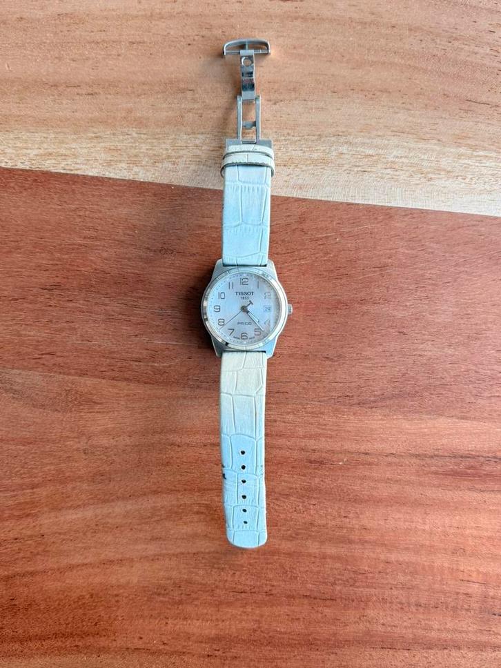 Tissot pr100., Sieraden, Tassen en Uiterlijk, Horloges | Dames, Zo goed als nieuw, Polshorloge, Overige merken, Leer, Ophalen