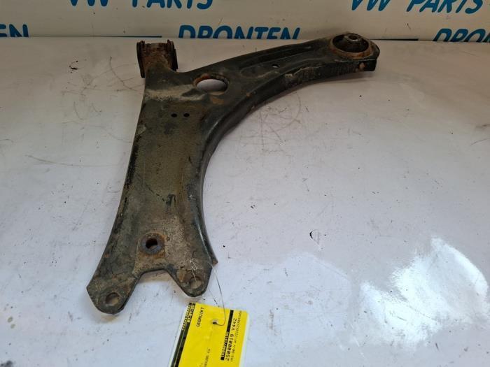 Draagarm links-voor van een Volkswagen Caddy, Auto-onderdelen, Ophanging en Onderstel, Volkswagen, Gebruikt, 3 maanden garantie