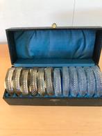 kristallen glasonderzetters met zilveren glas/ beker nummers, Ophalen