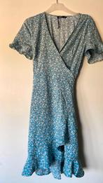 Overslagjurkje lichtblauw maat 40 nieuw, Kleding | Dames, Maat 38/40 (M), Nieuw, Boven de knie, Verzenden