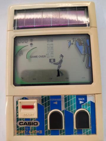 Casio CG-20 Vintage handheld game - Money & Bomb