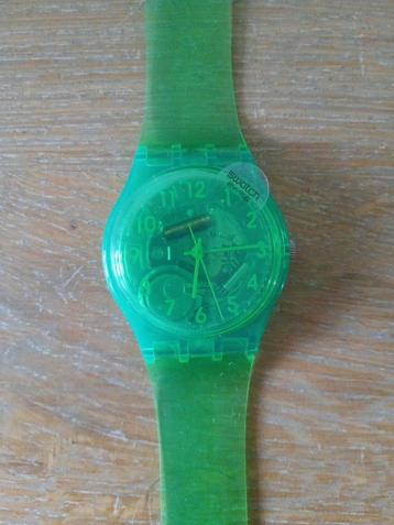 te koop nieuw Swatch groen transparant horloge 