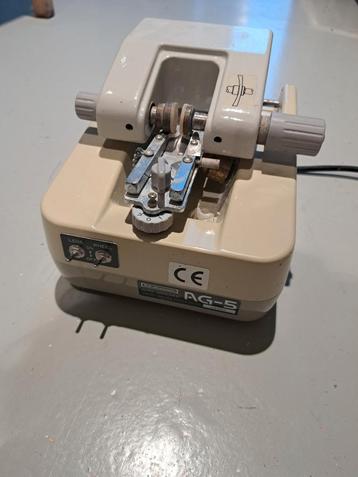 Takubomatic  Brillen Auto Groover lensgroefmachine  beschikbaar voor biedingen