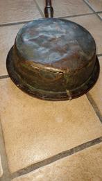 Koperen beddepan, Ophalen