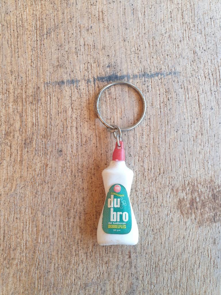 Vintage Dubro Sleutelhanger - Dubbelfles Wasmiddel, Ophalen of Verzenden, Gebruikt, Merk