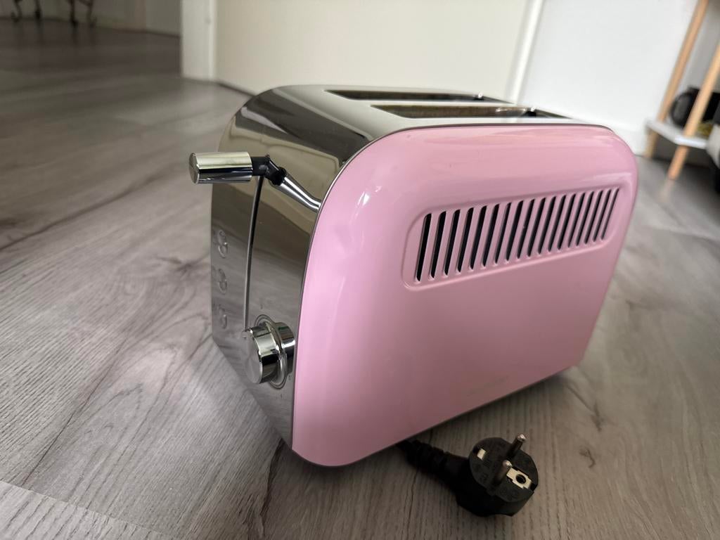 Roze broodrooster met 2 sleuven en kruimellade, Witgoed en Apparatuur, Ophalen of Verzenden, Zo goed als nieuw, Uitneembare kruimellade