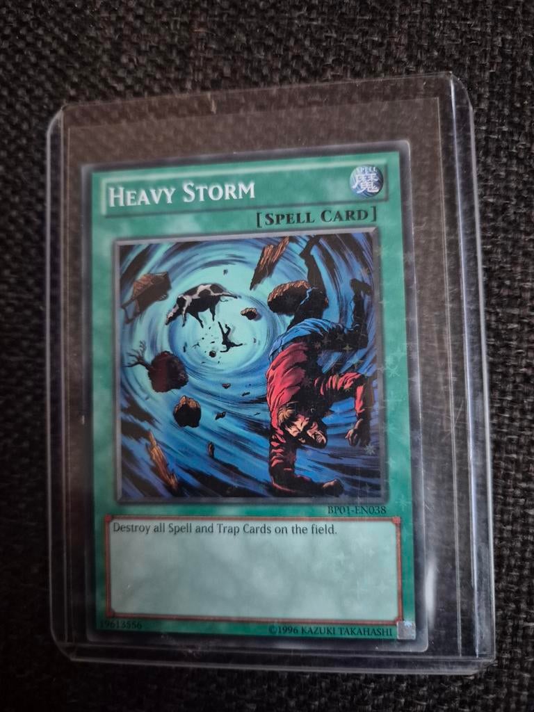 Yu-Gi-Oh! Heavy Storm Spell Card BPO1-EN038, Ophalen of Verzenden, Zo goed als nieuw, Losse kaart