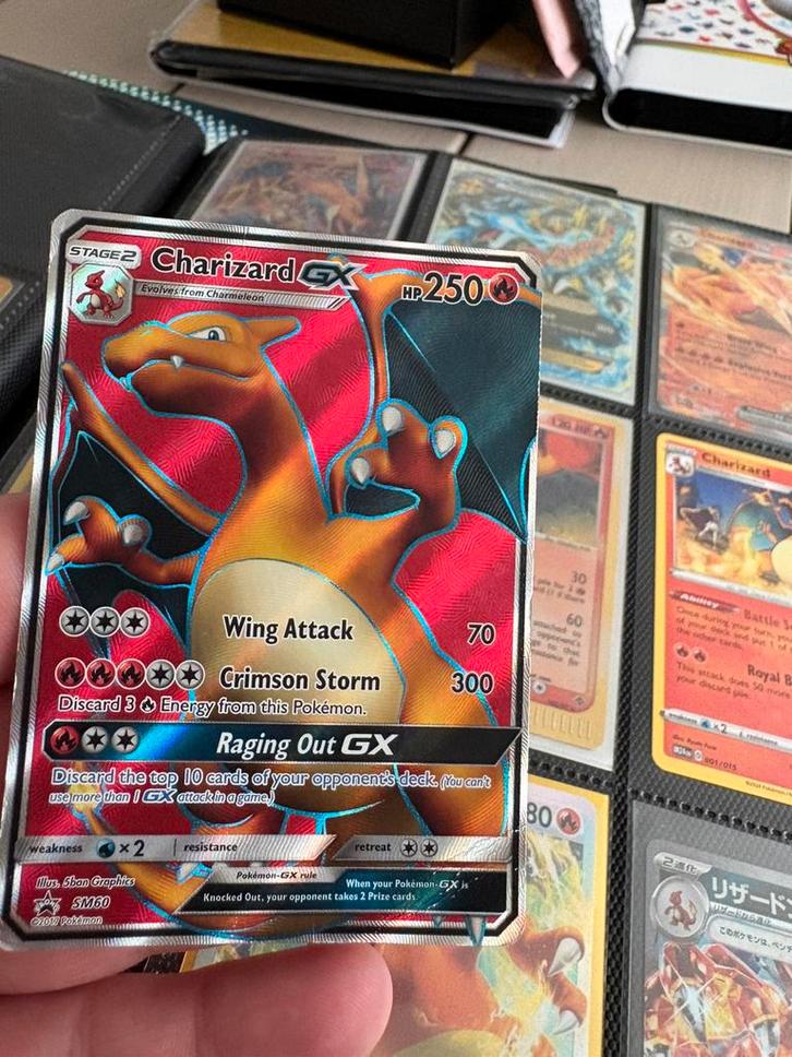 Charizard gx, Hobby en Vrije tijd, Verzamelkaartspellen | Pokémon, Zo goed als nieuw, Meerdere kaarten, Foil, Ophalen of Verzenden