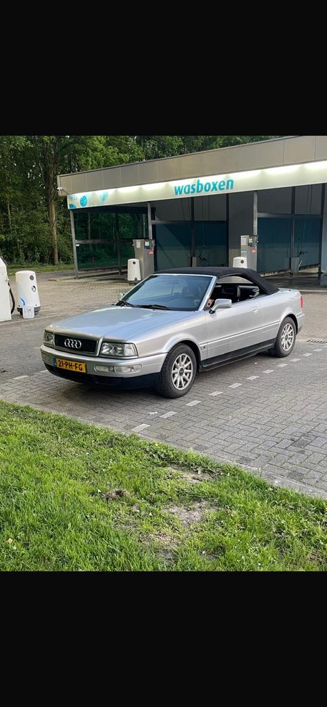 Audi Cabrio 2.6 1995 Grijs, Auto's, Audi, Zwart, Cabriolet, 4 stoelen, Leder en Stof