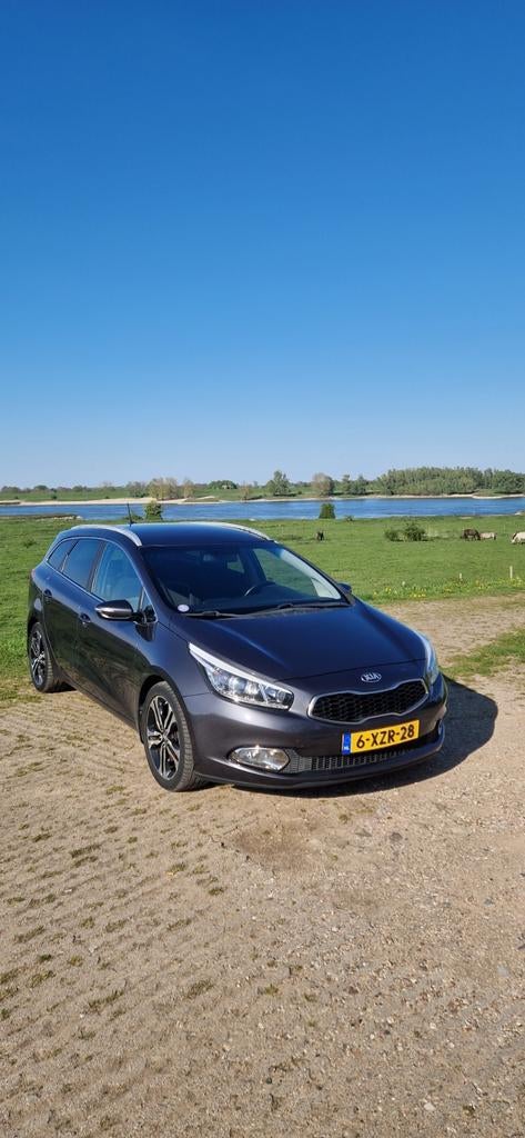Kia (Pro) Cee d 1.6 GDI Sporty Wagon 2015 Grijs, Auto's, Voorwielaandrijving, Stof, Parkeersensor, 1591 cc
