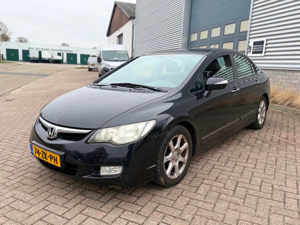 Honda Civic 1.3 Hybrid (bj 2008) AUTOMAAT/LEER/CLIMA/STOELVE, Auto's, Gebruikt, Stoelverwarming, Zwart, Bedrijf